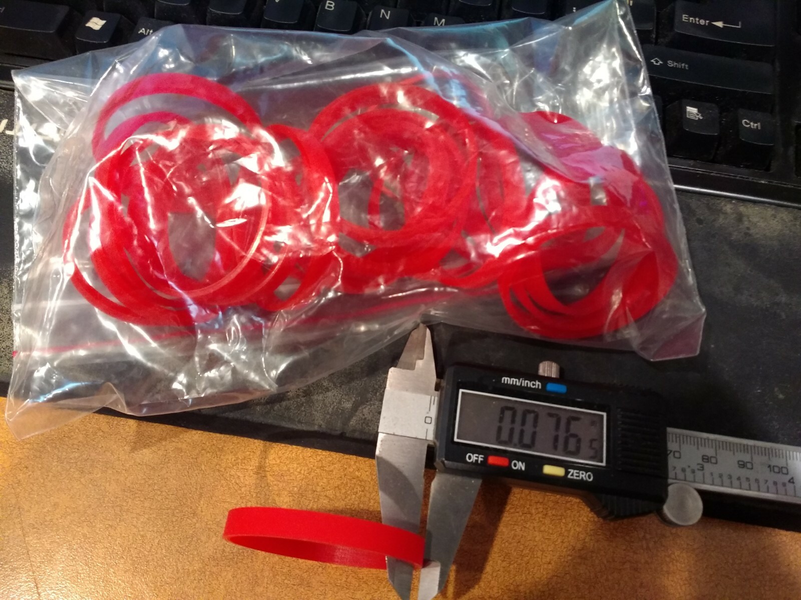 1.75 ID X 1/16″ Thick X 1/4″ Wide Red 65 Duro Rubber Band Urethane (Bag Of 25)