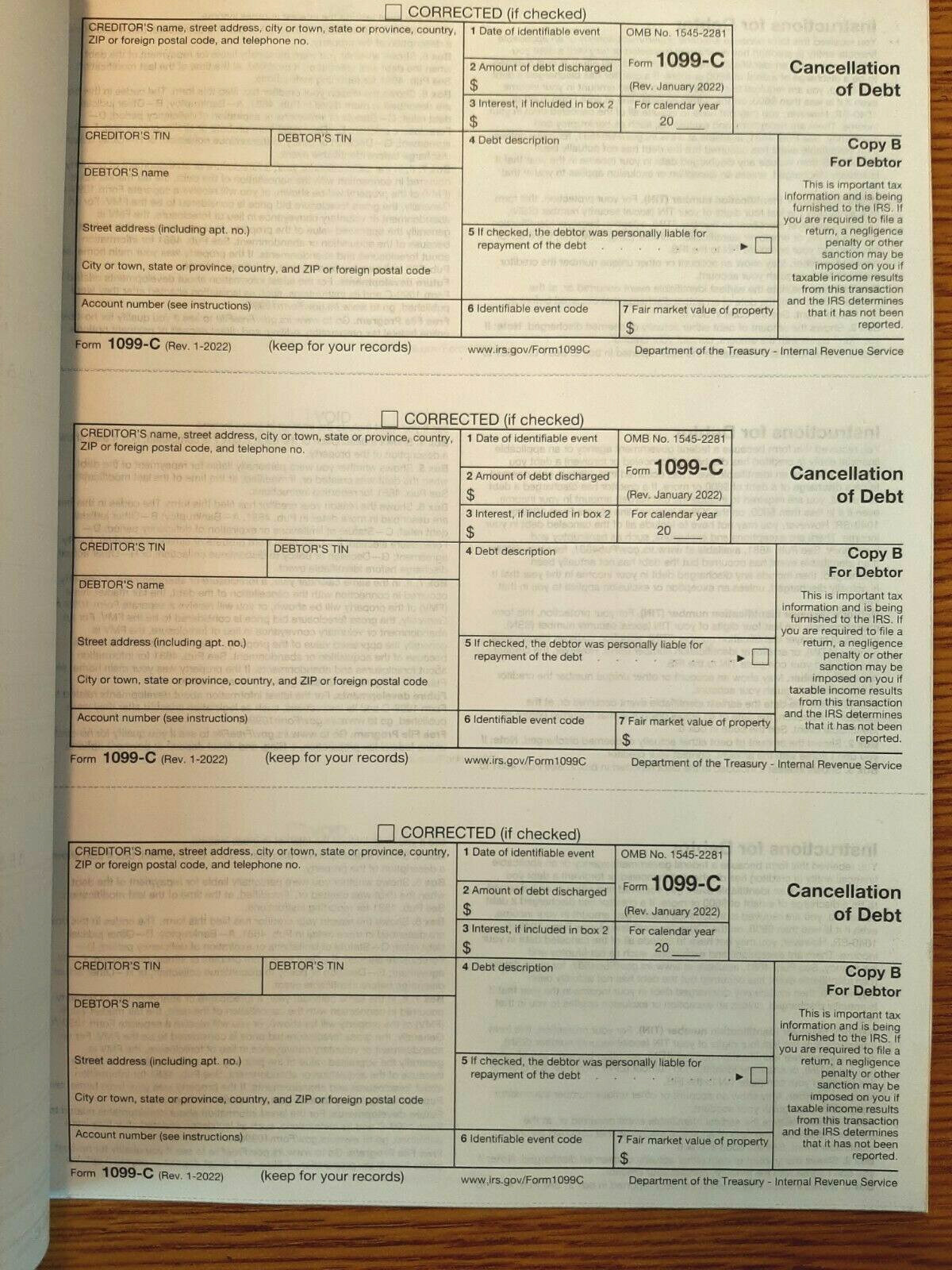 Undated IRS Tax Form 1099-C single sheet set for 3 debtors, carbonless 3-pt, 3UP