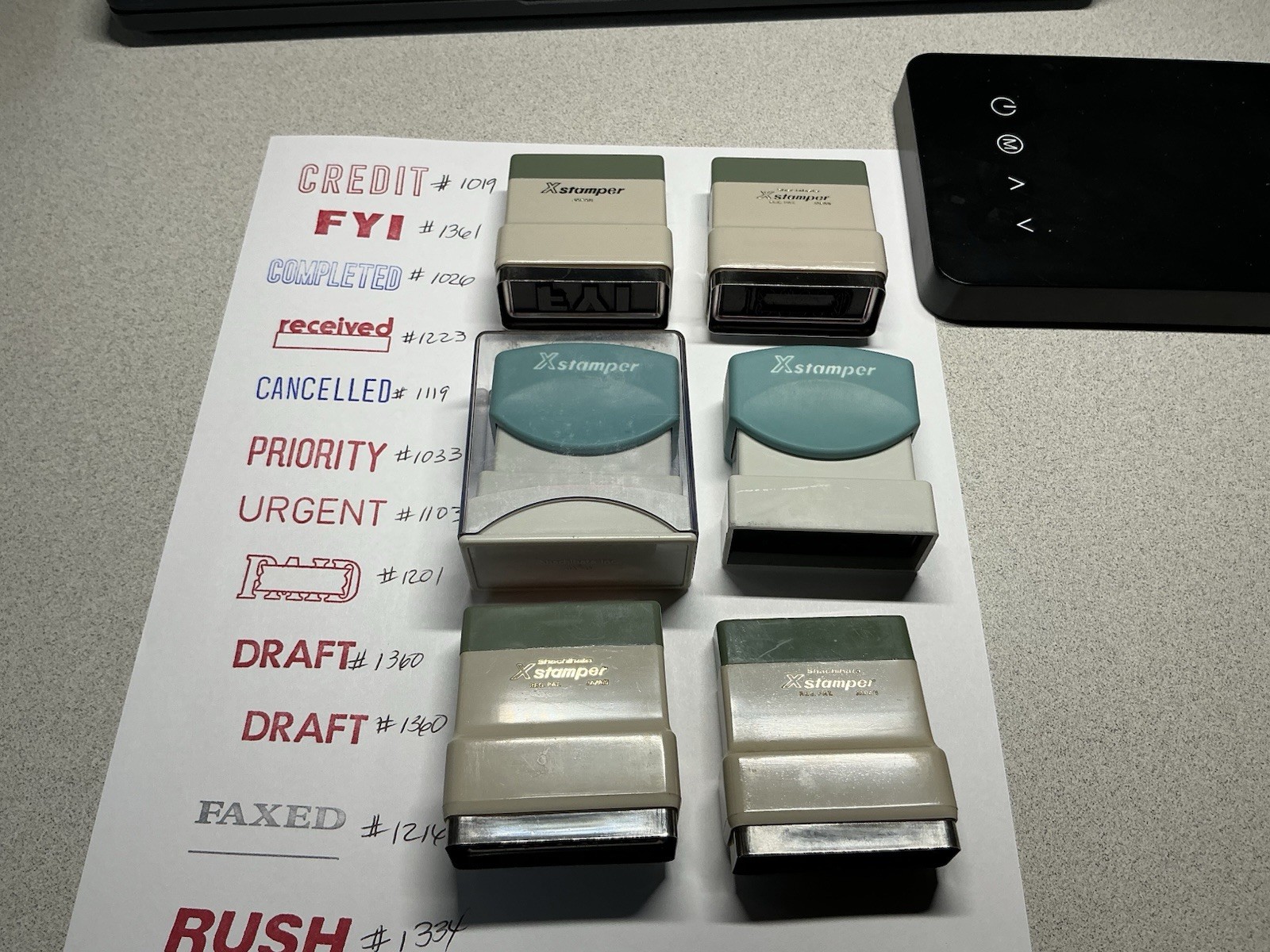 XSTAMPER Pre-Inked Rubber Stamps, Various Wording, 12 Total With Tray, Used