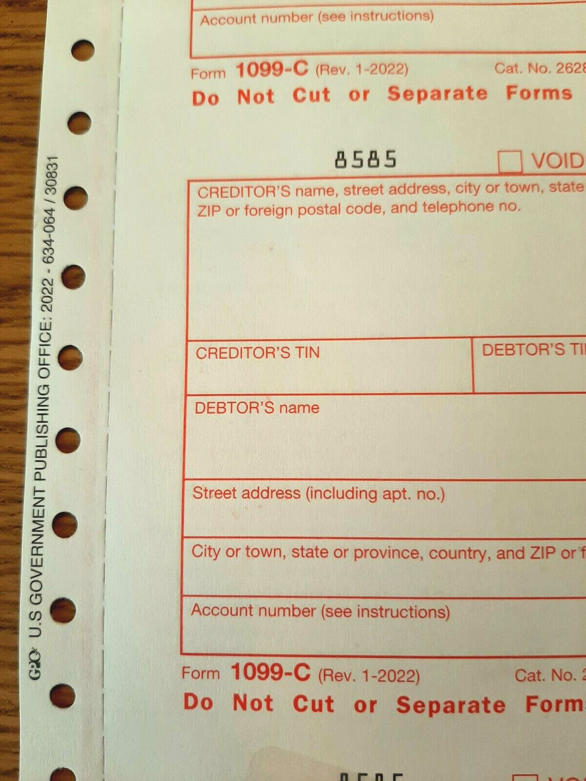 Undated IRS Tax Form 1099-C single sheet set for 3 debtors, carbonless 3-pt, 3UP