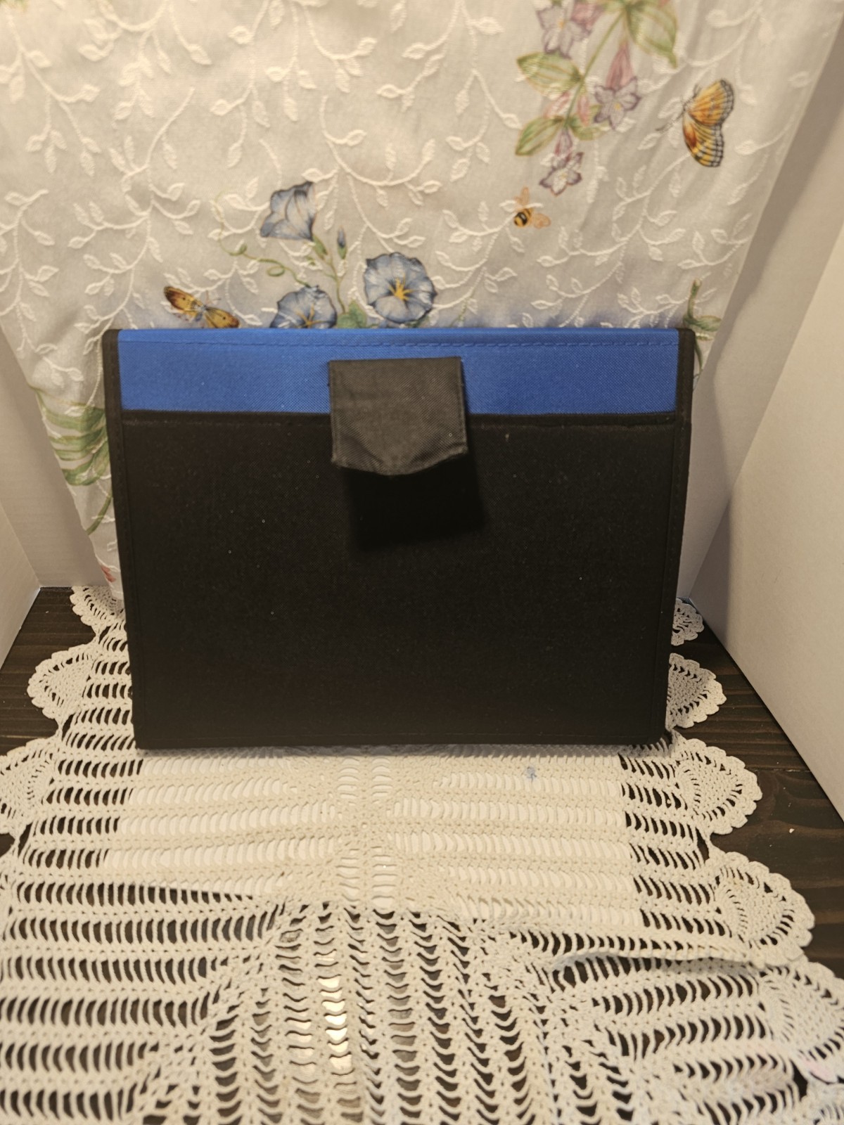 Two Blue And Black Binders By Ampads
