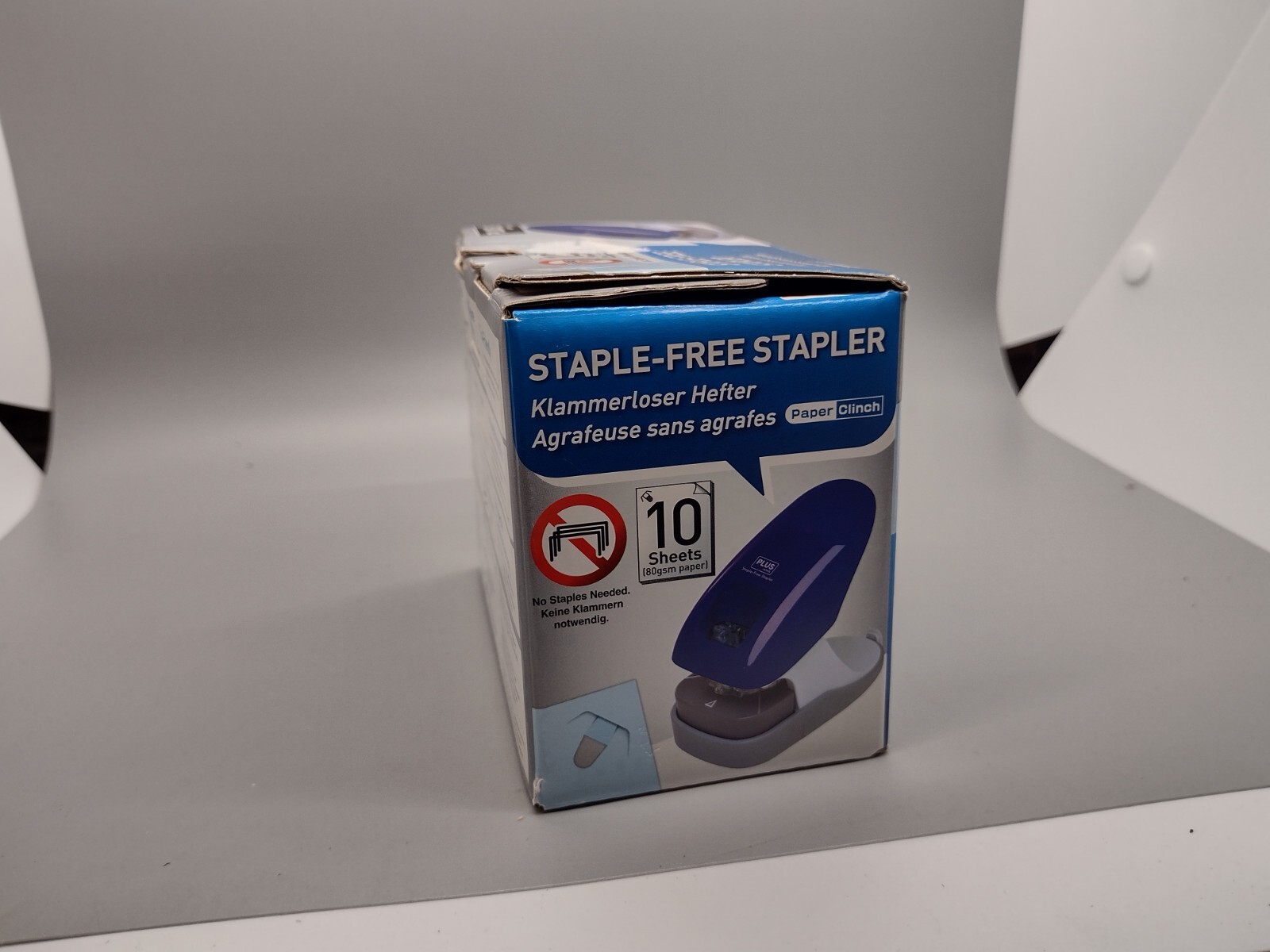 Plus Paper Clinch Desktop Staple Free Staple Blue Open Box