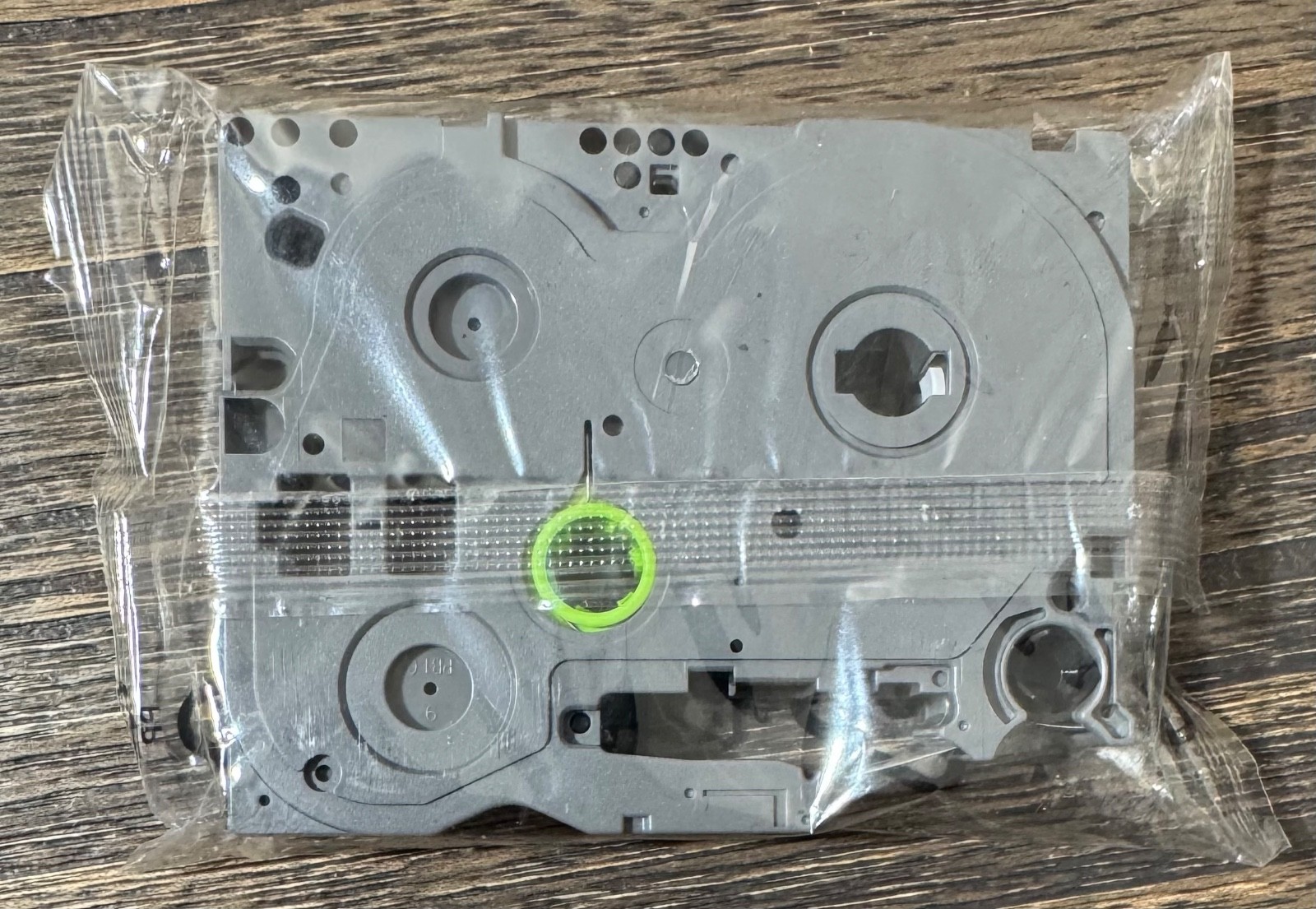 P-Touch Brother TZe-325 Label Tape 3/8″ | White Print On Black Tape