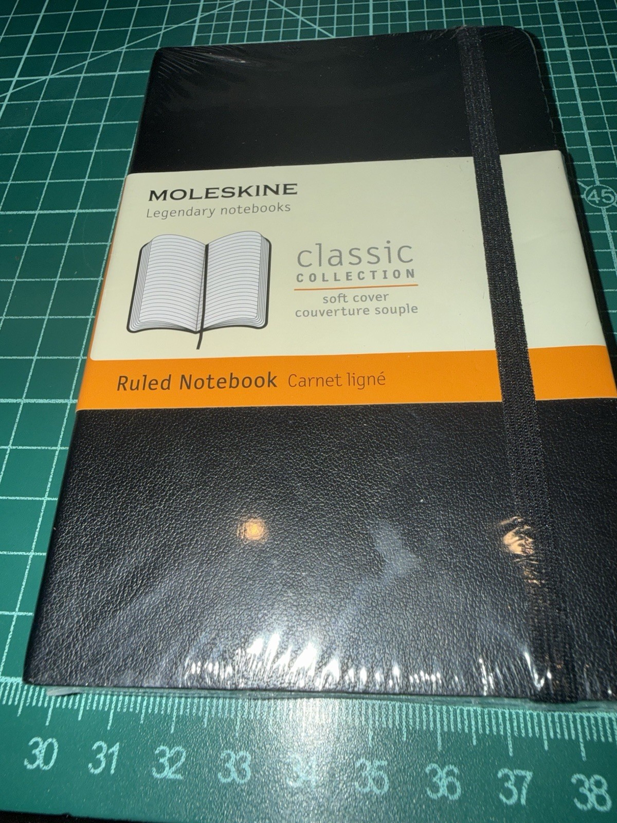 Notebook Pocket (A6) Softcover, 121 Numbered Pages, Plain, Black